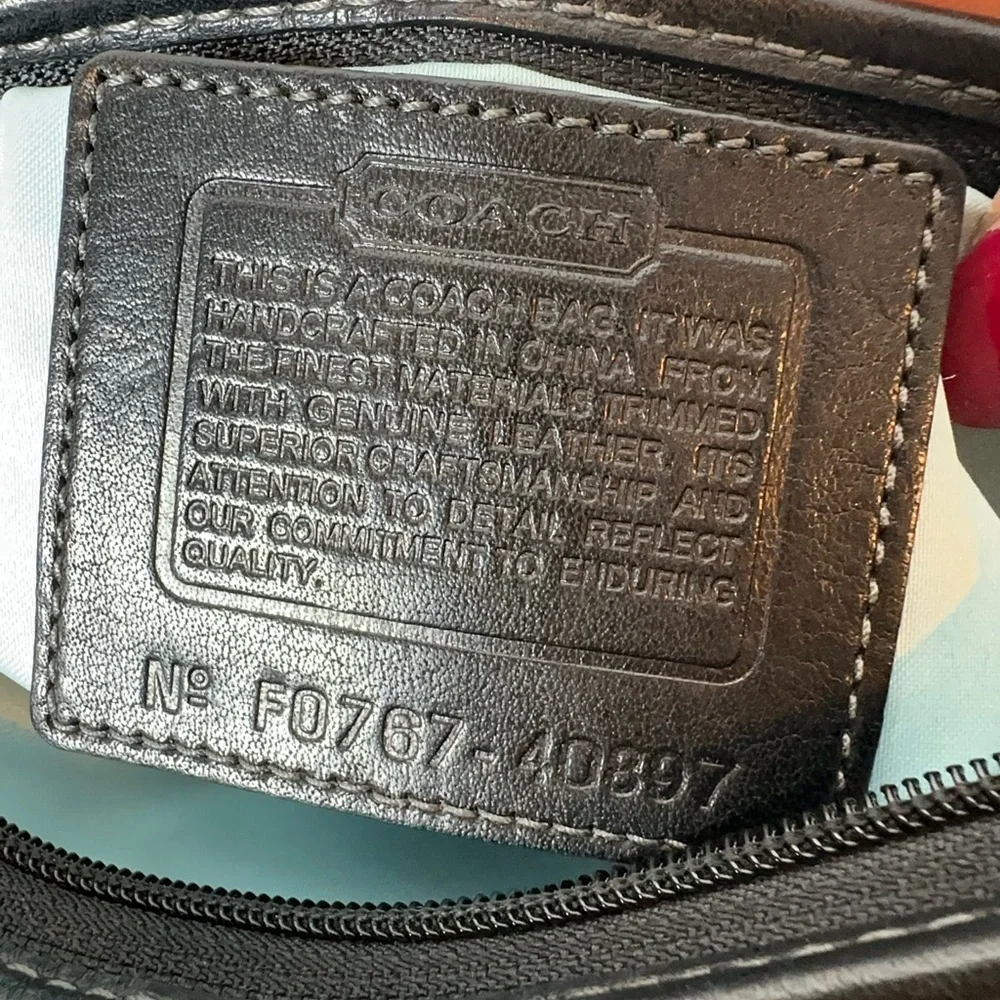 Coach Black Signature Crossbody Bag with brass hardware